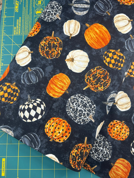 Black Multi Pumpkin fabric by Norhcott