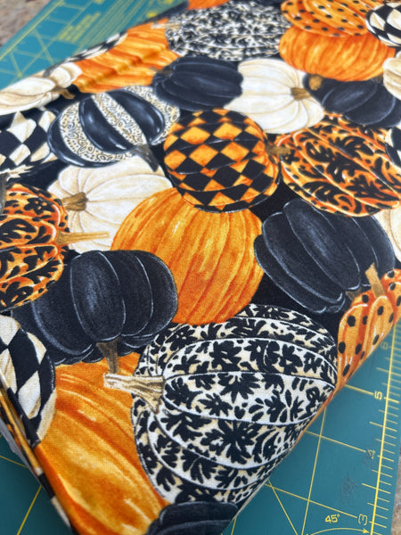 Multi Pumpkin fabric by Norhcott