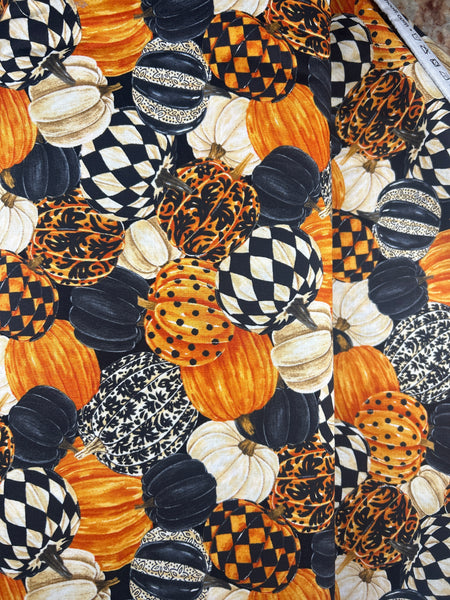 Multi Pumpkin fabric by Norhcott