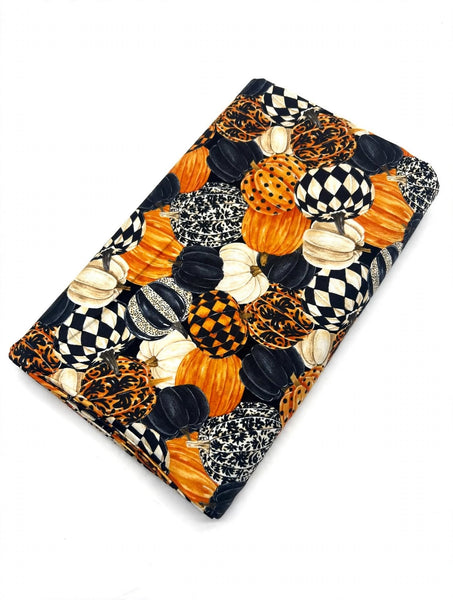 Multi Pumpkin fabric by Norhcott