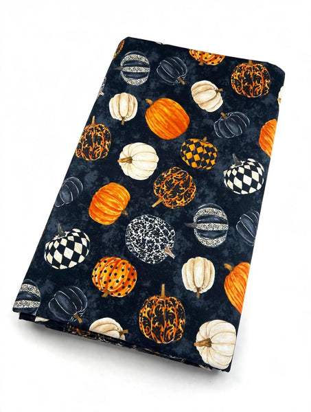 Black Multi Pumpkin fabric by Norhcott